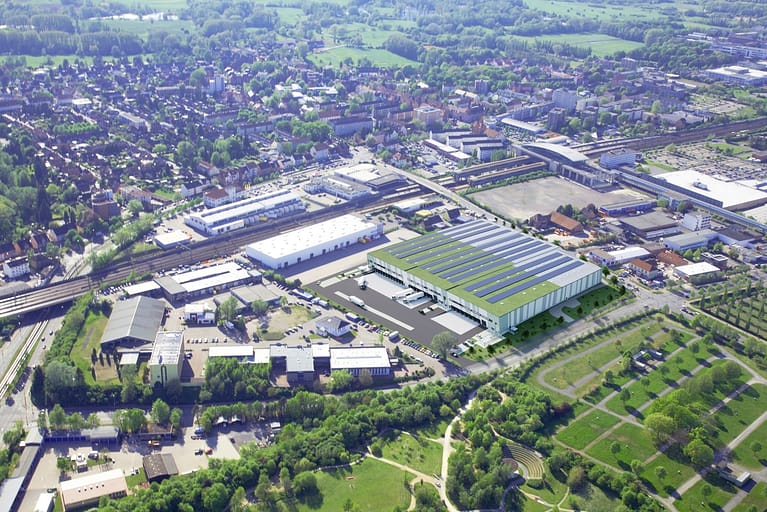 Luftbild mit Rendering des Neubaus einer Logistikhalle in Laatzen nahe Hannover