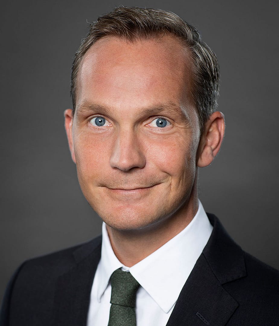 Portraitfoto von Philipp Enenkel, Leiter Real Estate Management